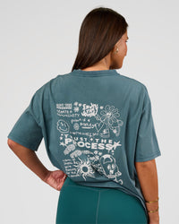 Woman wearing Built On Values Oversized Washed Tee - Transformative Teal Washed-White | Model:Bianca | Size:S | Thumbnail Index: 0
