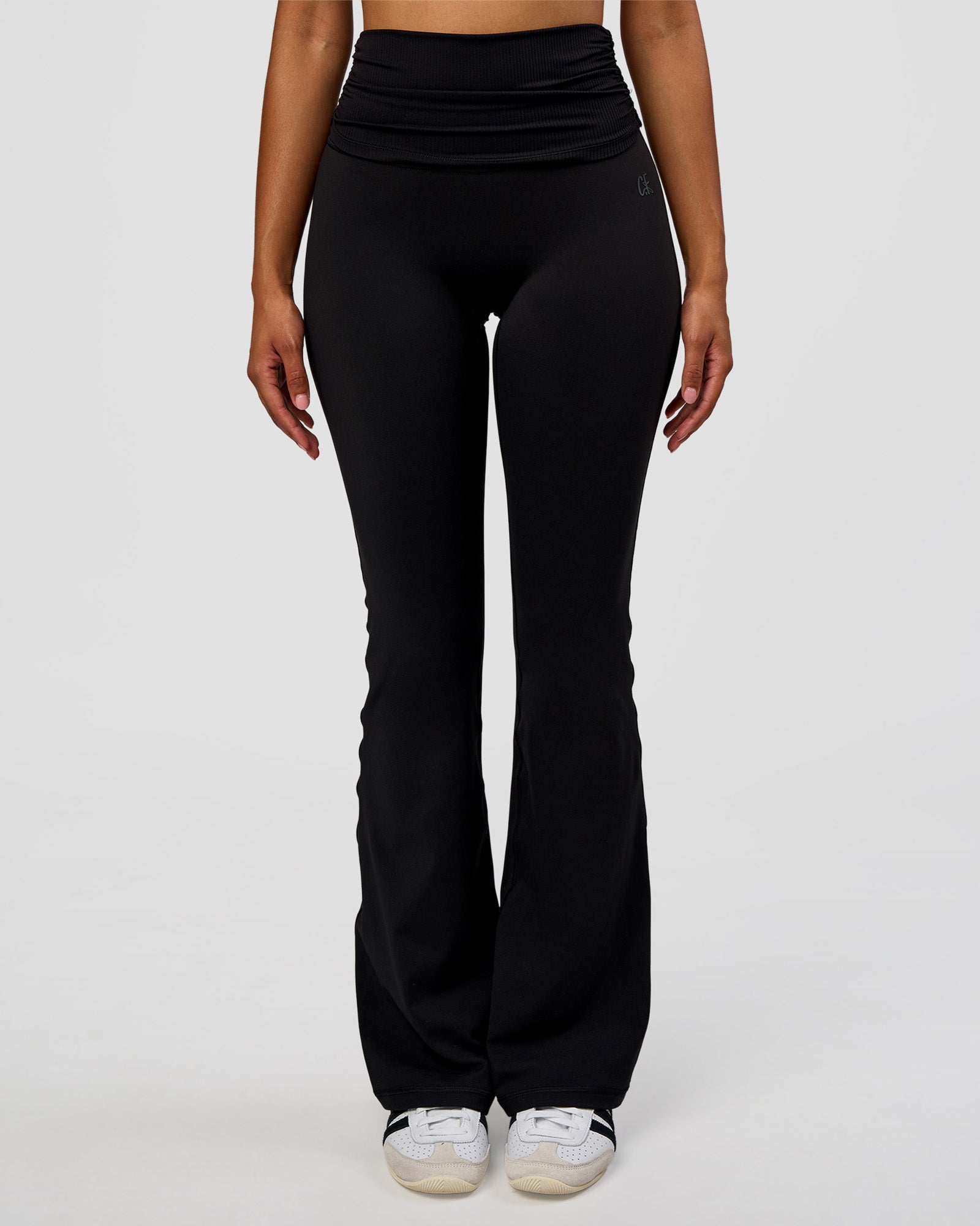 Woman wearing CF Fold Over High-Rise Flared Legging - Black | Model:Jordan | Size:S