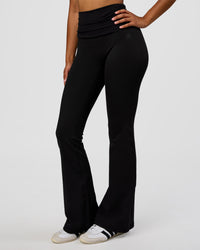 Woman wearing CF Fold Over High-Rise Flared Legging - Black | Model:Jordan | Size:S | Thumbnail Index: 8