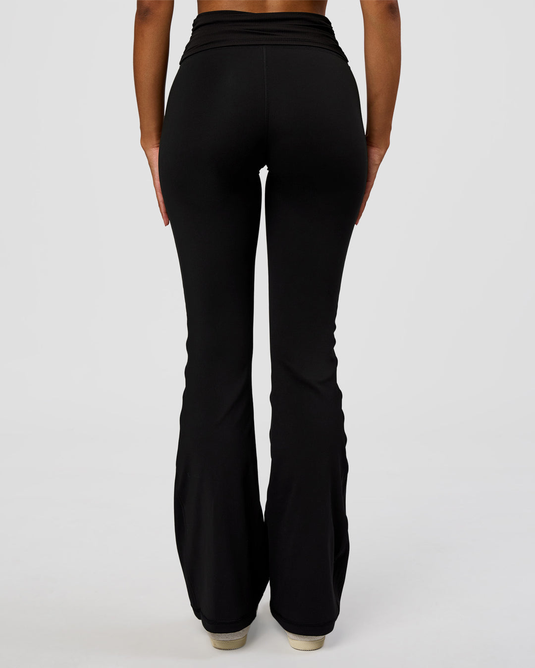 Woman wearing CF Fold Over High-Rise Flared Legging - Black | Model:Jordan | Size:S - view 4