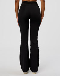 Woman wearing CF Fold Over High-Rise Flared Legging - Black | Model:Jordan | Size:S | Thumbnail Index: 3