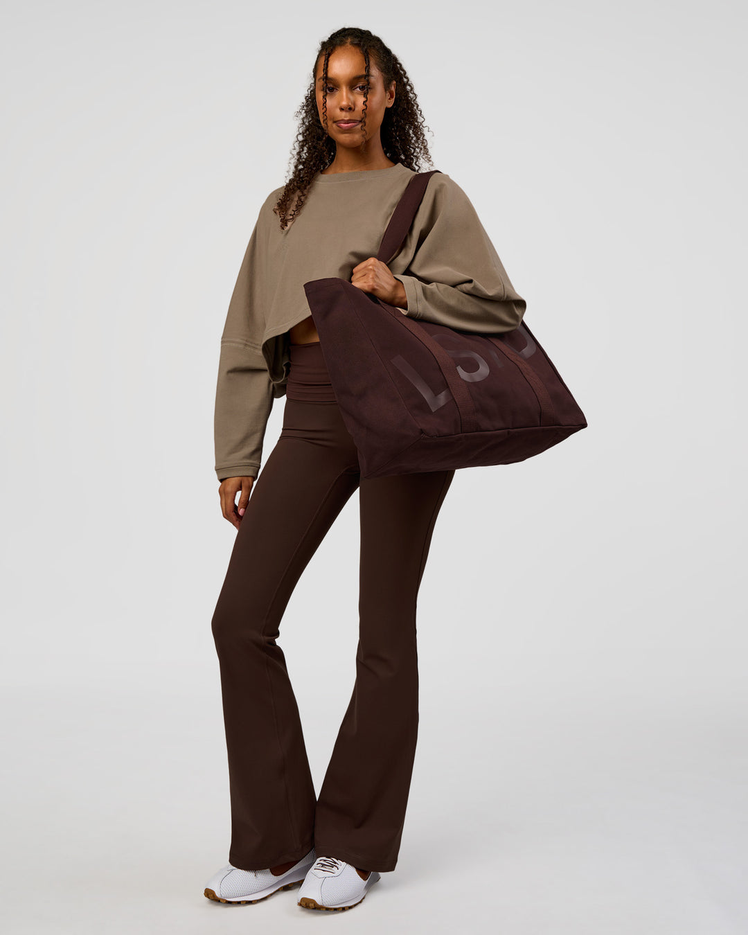 Model wearing CF Fold Over High-Rise Flared Legging - Hot Chocolate | Model:Jordan | Size:S - view 10