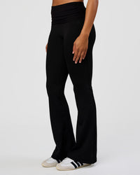 Woman wearing CF Fold Over High-Rise Flared Legging Tall - Black | Model:Rosie | Size:S | Thumbnail Index: 5