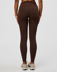 Woman wearing CF Fold Over High-Rise Full Length Legging - Hot Chocolate | Model:Jordan | Size:S | Thumbnail Index: 1