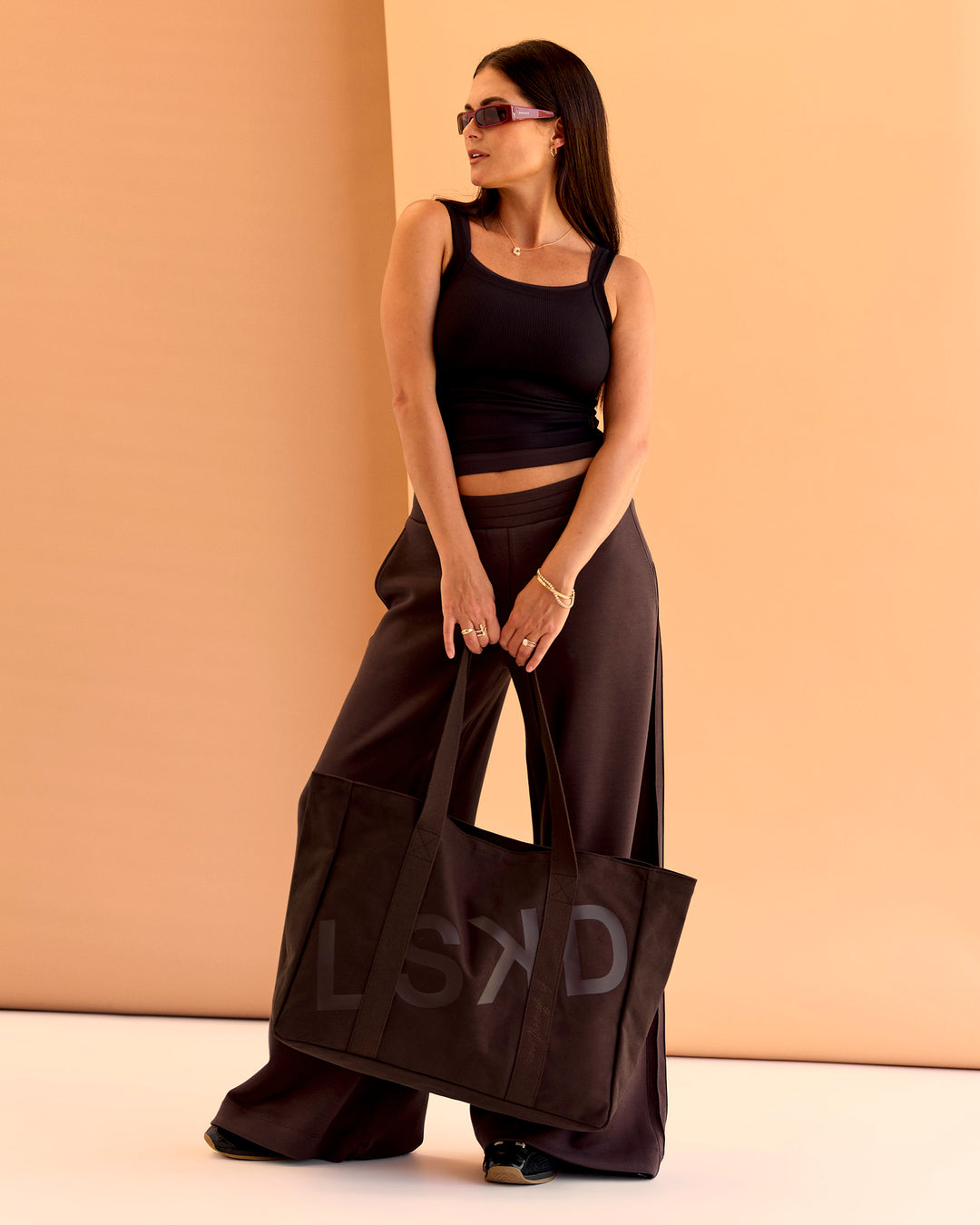 Woman wearing CF Move Through It Rib Tank - Black | Model:Chloe | Size:S - view 3