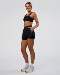 Woman wearing Challenger 3" Lined Performance Short - Black | Model:Amity | Size:S | Thumbnail Index: 4
