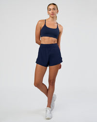 Woman wearing Challenger 3" Lined Performance Short - Future Navy | Model:Evie | Size:S | Thumbnail Index: 4