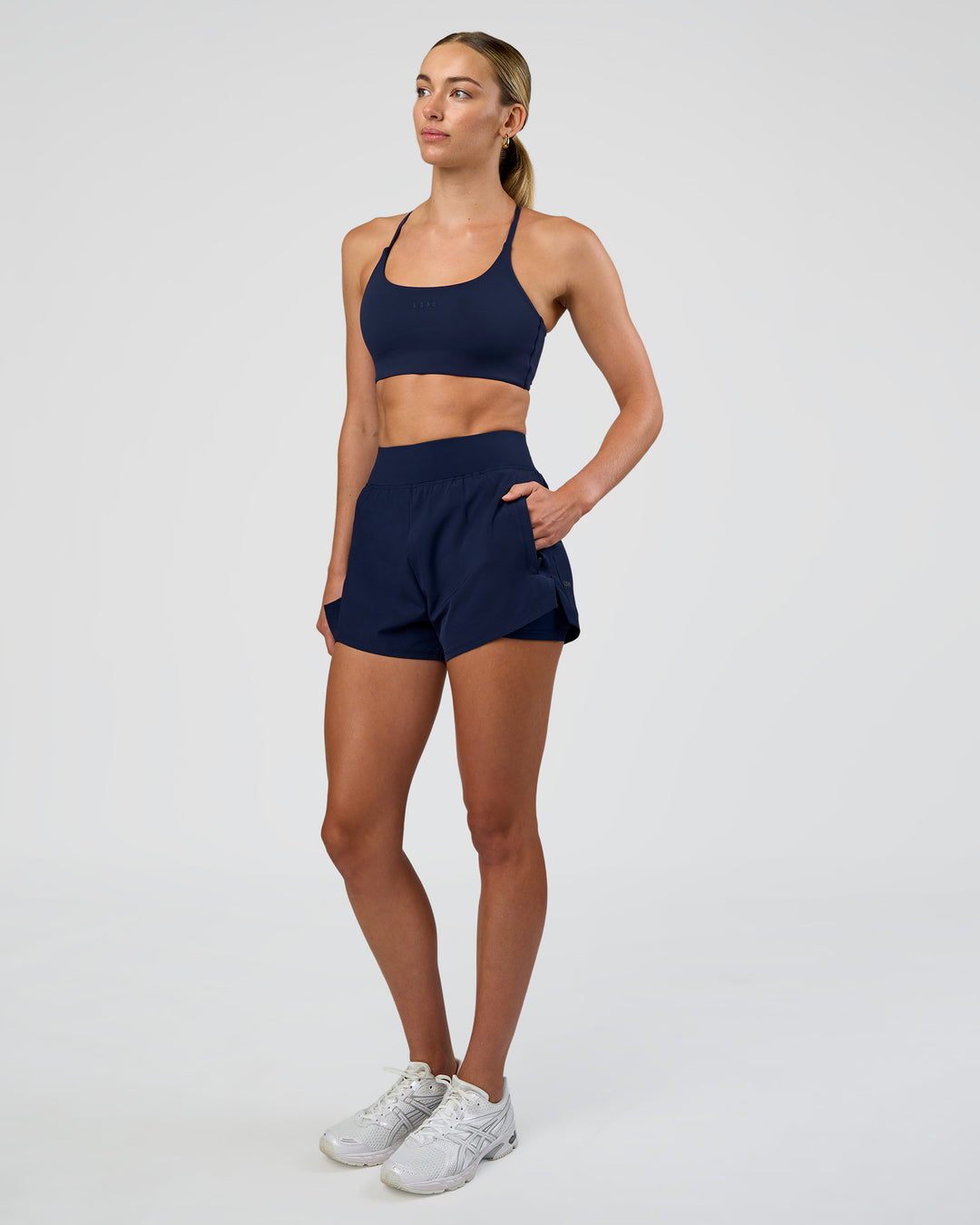 Woman wearing Challenger 3" Lined Performance Short - Future Navy | Model:Evie | Size:S - view 9