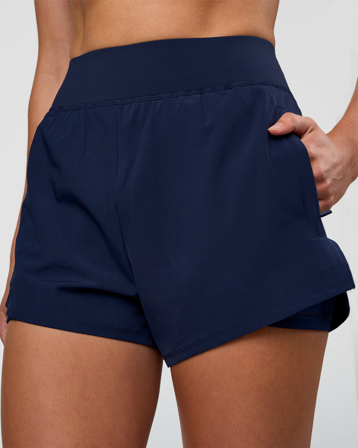 Woman wearing Challenger 3" Lined Performance Short - Future Navy | Model:Evie | Size:S
