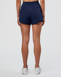Woman wearing Challenger 3" Lined Performance Short - Future Navy | Model:Evie | Size:S | Thumbnail Index: 3