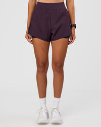 Woman wearing Challenger 3" Lined Performance Short - Midnight Plum | Model:Rhiley | Size:S | Thumbnail Index: 2