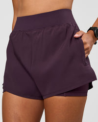 Woman wearing Challenger 3" Lined Performance Short - Midnight Plum | Model:Rhiley | Size:S | Thumbnail Index: 7