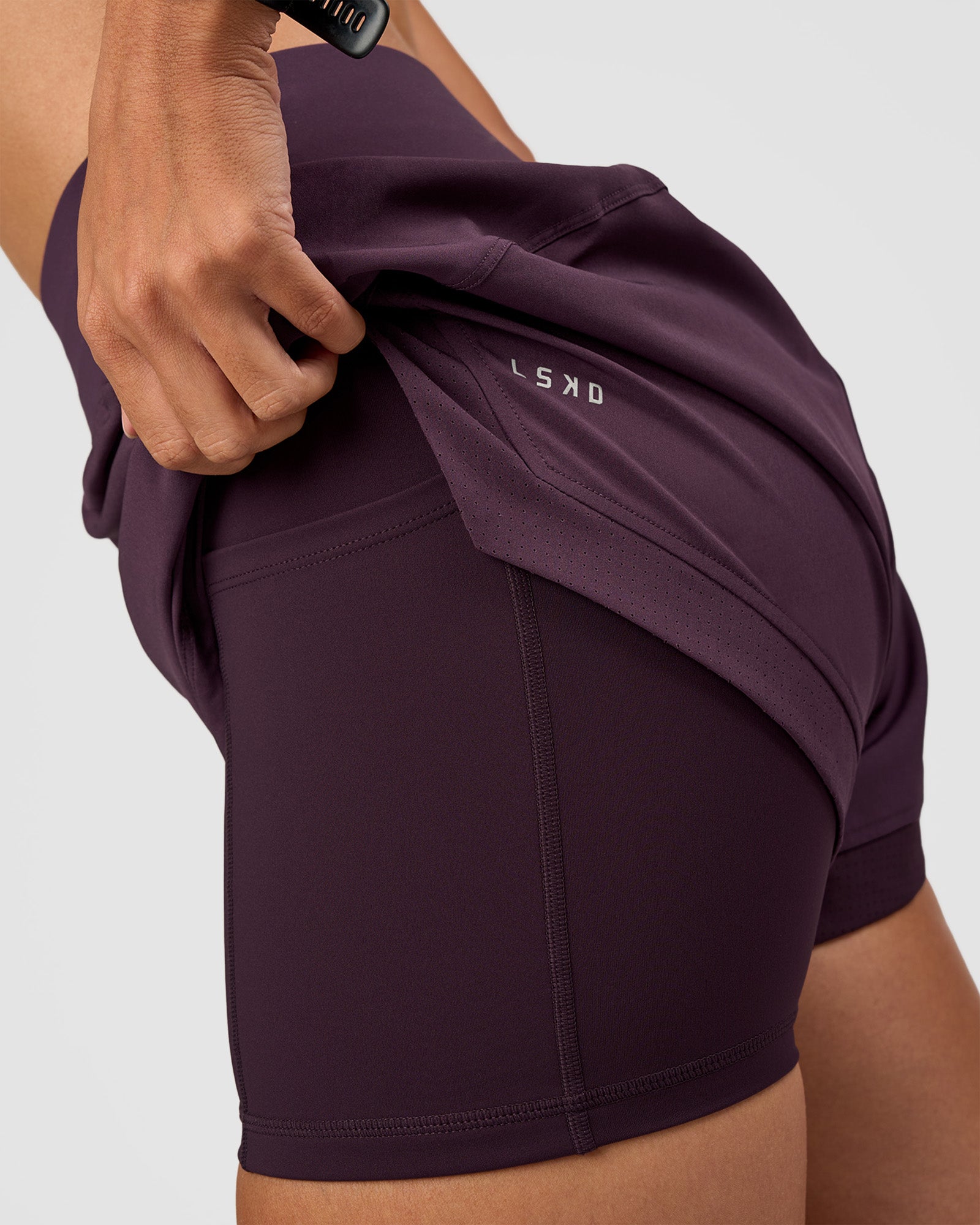 Woman wearing Challenger 3" Lined Performance Short - Midnight Plum | Model:Rhiley | Size:S