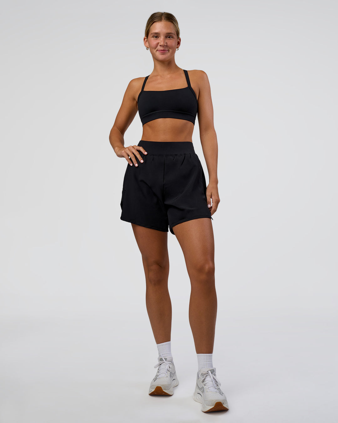 Woman wearing Challenger 5" Lined Performance Short - Black | Model:Amity | Size:S - view 1