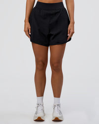 Woman wearing Challenger 5" Lined Performance Short - Black | Model:Amity | Size:S | Thumbnail Index: 7