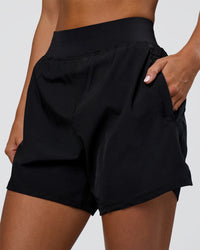 Woman wearing Challenger 5" Lined Performance Short - Black | Model:Amity | Size:S | Thumbnail Index: 5