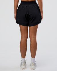 Woman wearing Challenger 5" Lined Performance Short - Black | Model:Amity | Size:S | Thumbnail Index: 3