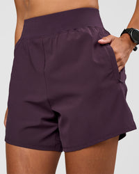 Woman wearing Challenger 5" Lined Performance Short - Midnight Plum | Model:Rhiley | Size:S | Thumbnail Index: 5