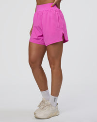 Woman wearing Challenger 5" Lined Performance Short - Ultra Fuchsia | Model:Abbey | Size:S | Thumbnail Index: 0