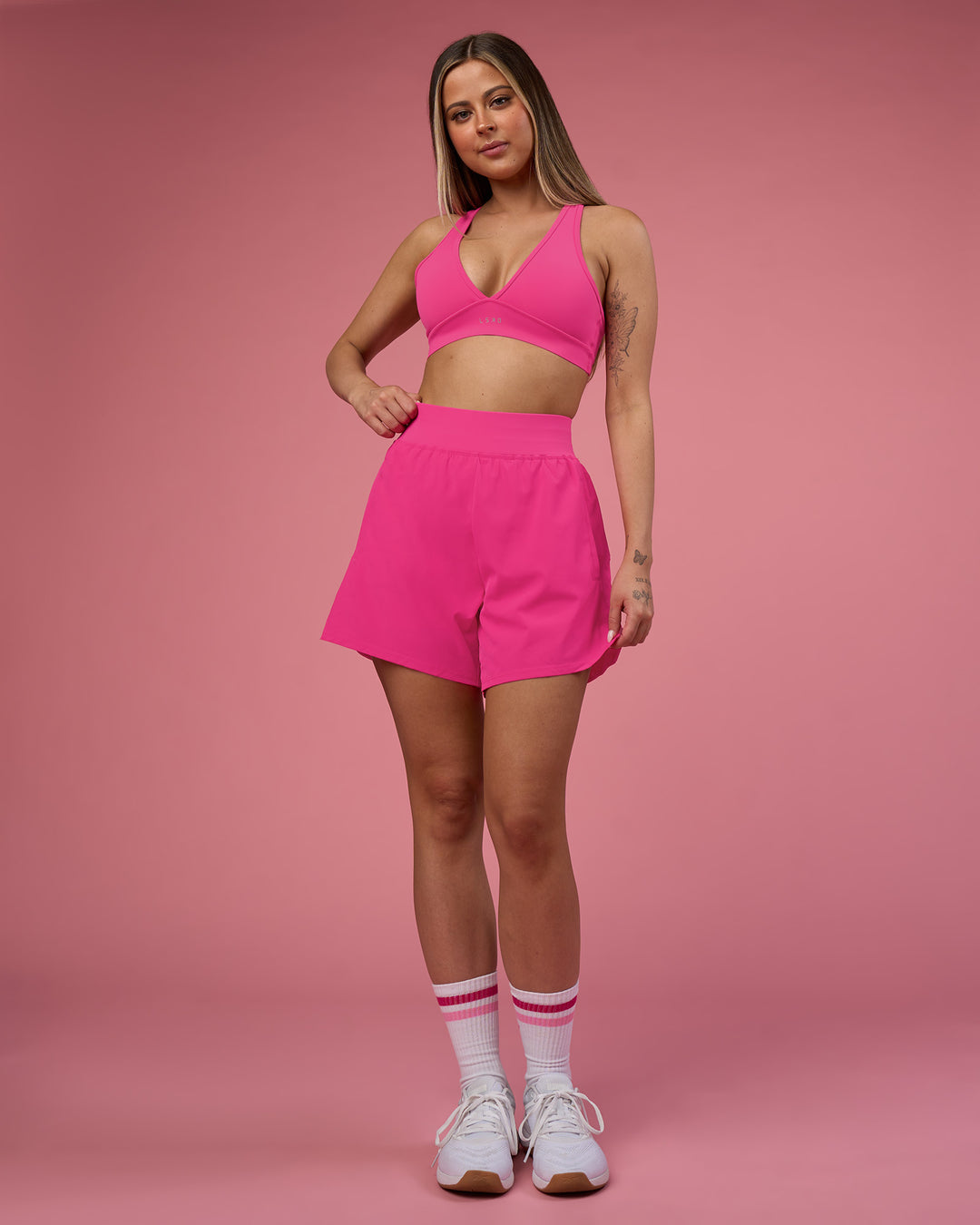 Woman wearing Challenger 5" Lined Performance Short - Ultra Pink | Model:Tianah | Size:S - view 1