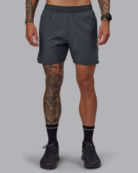 Man wearing Challenger 6" Performance Short in Dark Storm | Size:S | Thumbnail Index: 0