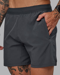 Man wearing Challenger 6" Performance Short in Dark Storm | Size:S | Thumbnail Index: 2