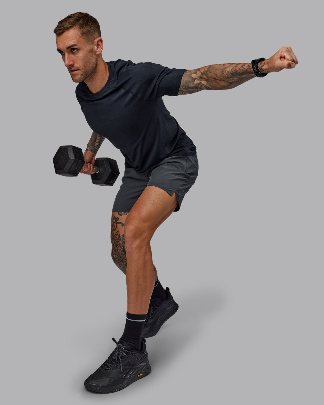 Man wearing Challenger 6" Performance Short in Dark Storm | Size:S - view 2