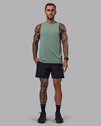 Man wearing Challenger 6" Performance Shorts in Black | Size:S | Thumbnail Index: 5