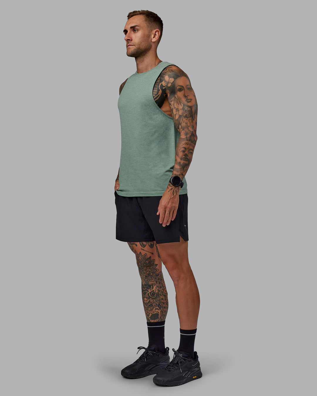 Man wearing Challenger 6" Performance Shorts in Black | Size:S - view 2