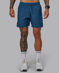 Man wearing Challenger 6" Performance Short in Indigo | Size:S | Thumbnail Index: 0