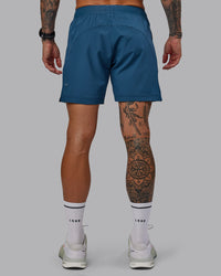 Man wearing Challenger 6" Performance Short in Indigo | Size:S | Thumbnail Index: 3