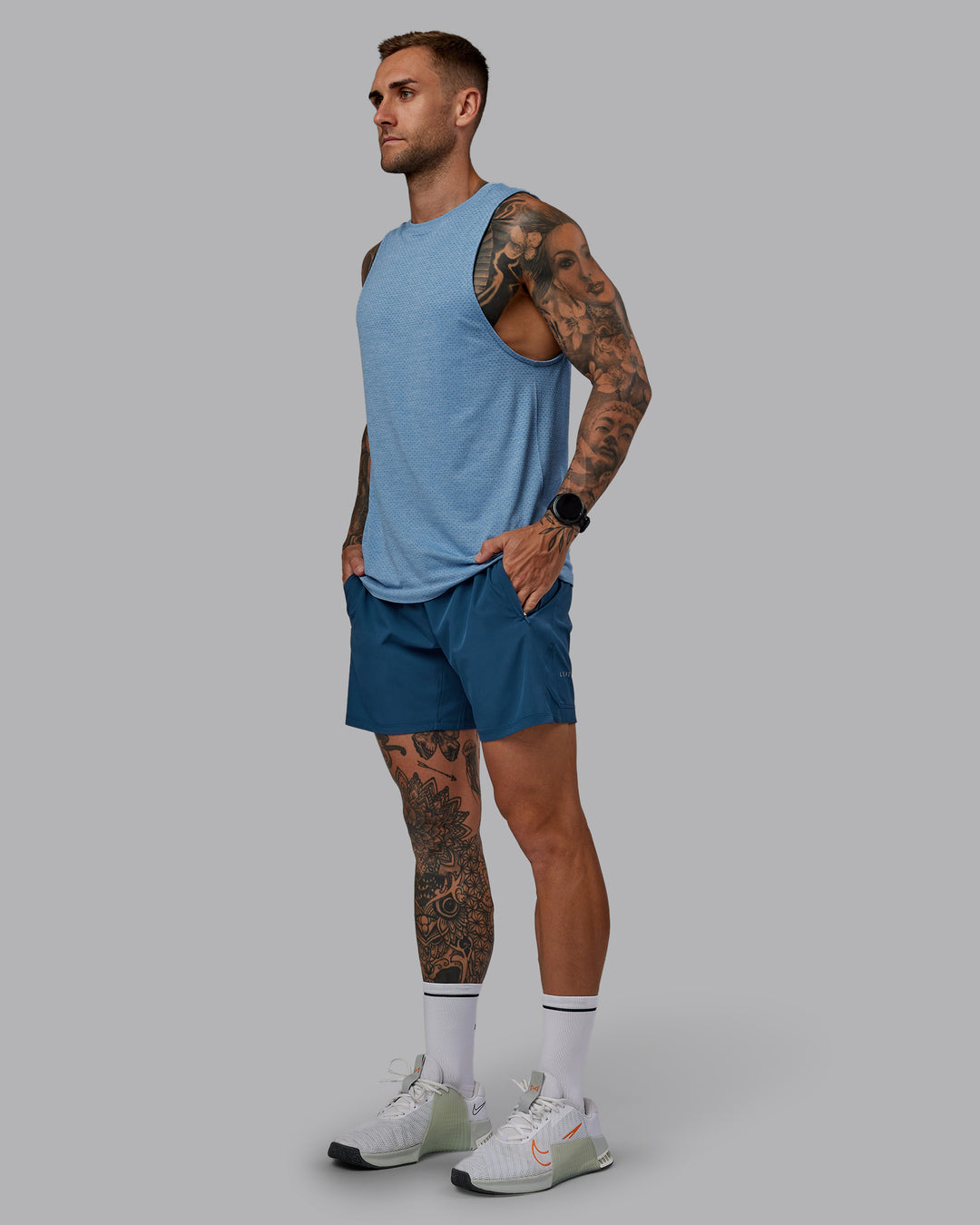Man wearing Challenger 6" Performance Short in Indigo | Size:S - view 7