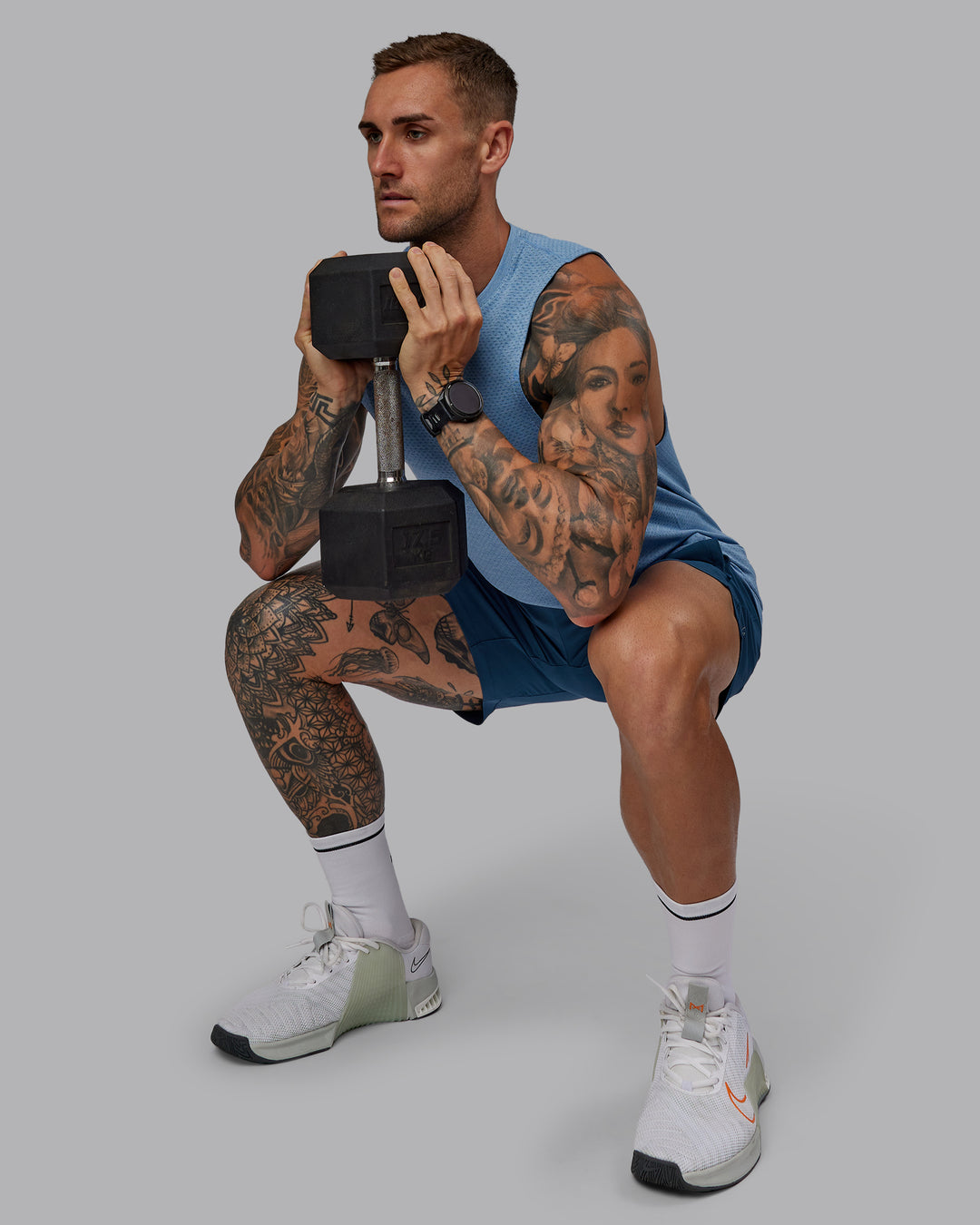 Man wearing Challenger 6" Performance Short in Indigo | Size:S - view 6