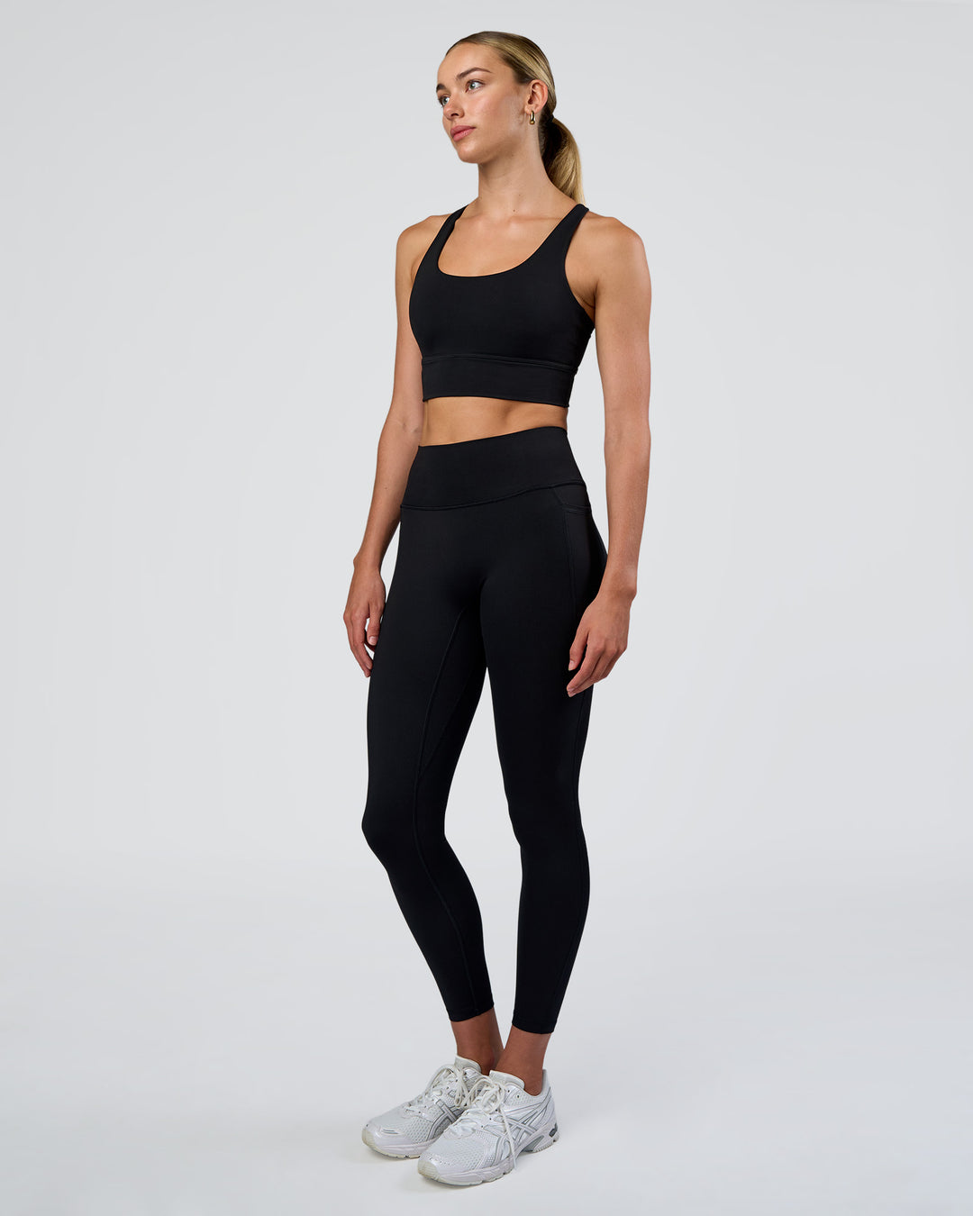 Woman wearing Circuit Longline Sports Bra - Black | Model:Evie | Size:S - view 5