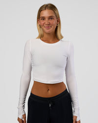 Woman wearing Clarity Long Sleeve Tee - White | Model:Amity | Size:S | Thumbnail Index: 0