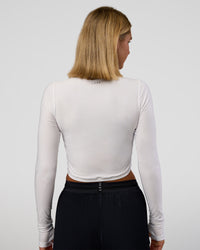 Woman wearing Clarity Long Sleeve Tee - White | Model:Amity | Size:S | Thumbnail Index: 3