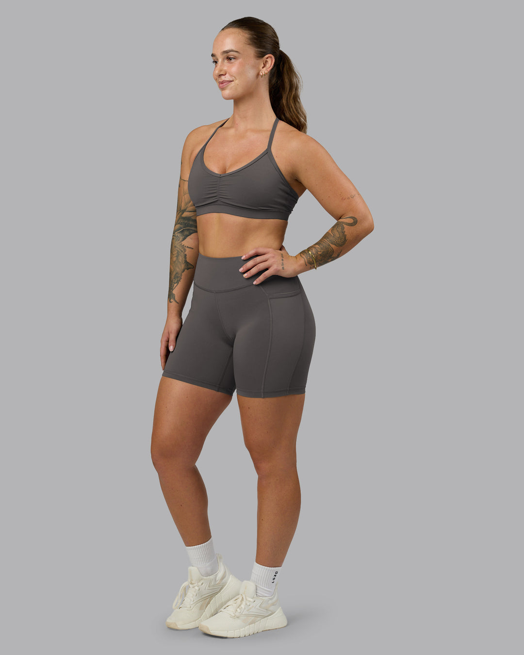 Woman wearing Clarity Sports Bra - Dark Storm | Model:Robyn | Size:S - view 4