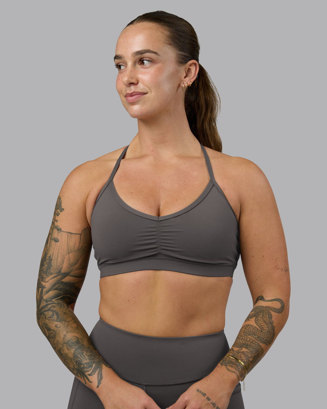 Woman wearing Clarity Sports Bra - Dark Storm | Model:Robyn | Size:S - view 2
