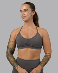 Woman wearing Clarity Sports Bra - Dark Storm | Model:Robyn | Size:S | Thumbnail Index: 1