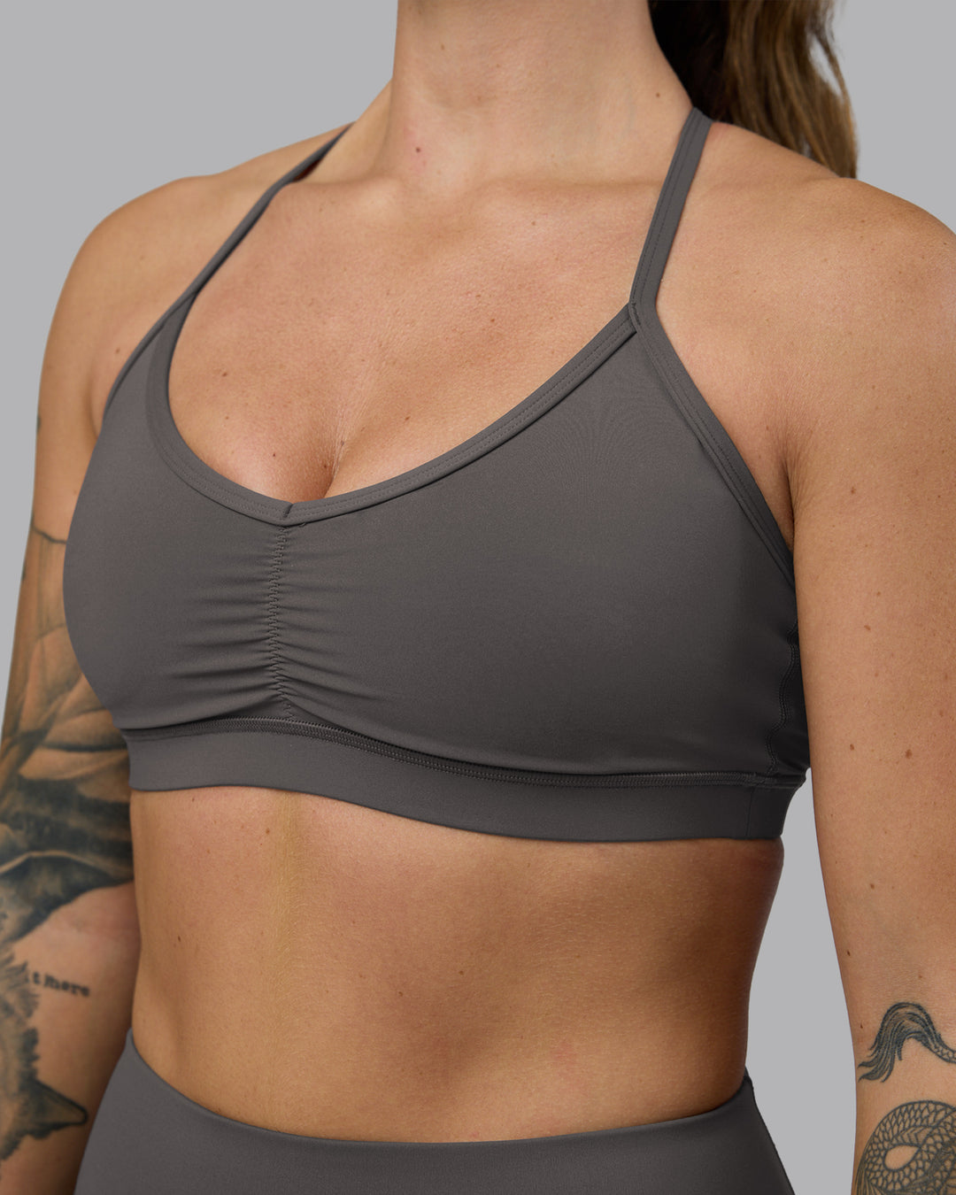 Woman wearing Clarity Sports Bra - Dark Storm | Model:Robyn | Size:S - view 5