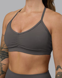 Woman wearing Clarity Sports Bra - Dark Storm | Model:Robyn | Size:S | Thumbnail Index: 4