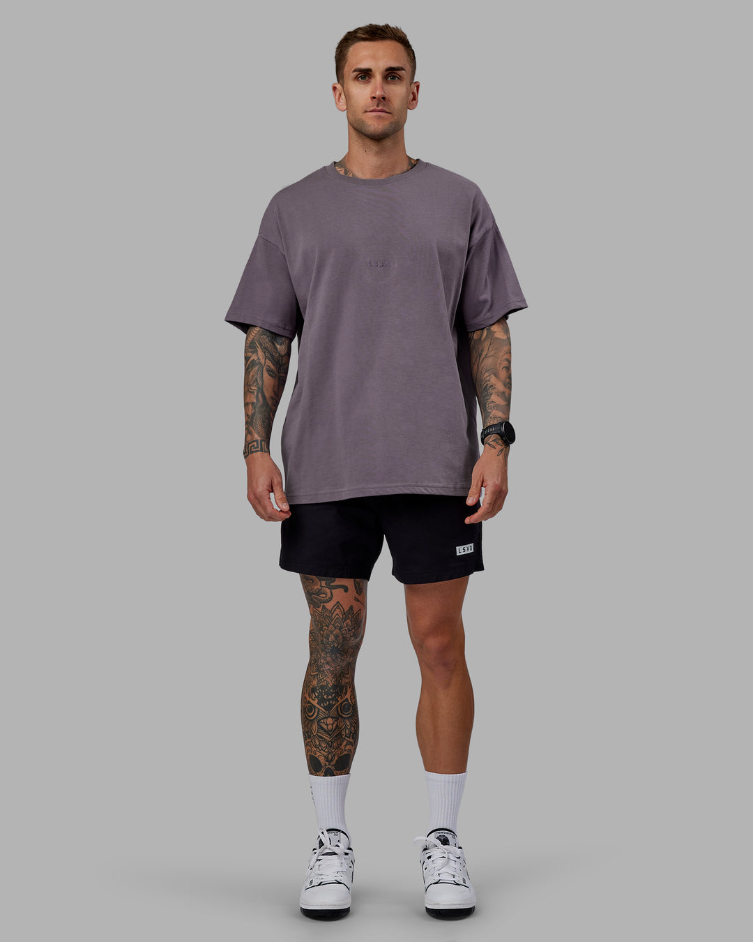 Man wearing Daily 5" Shorts - Black-White - view 5