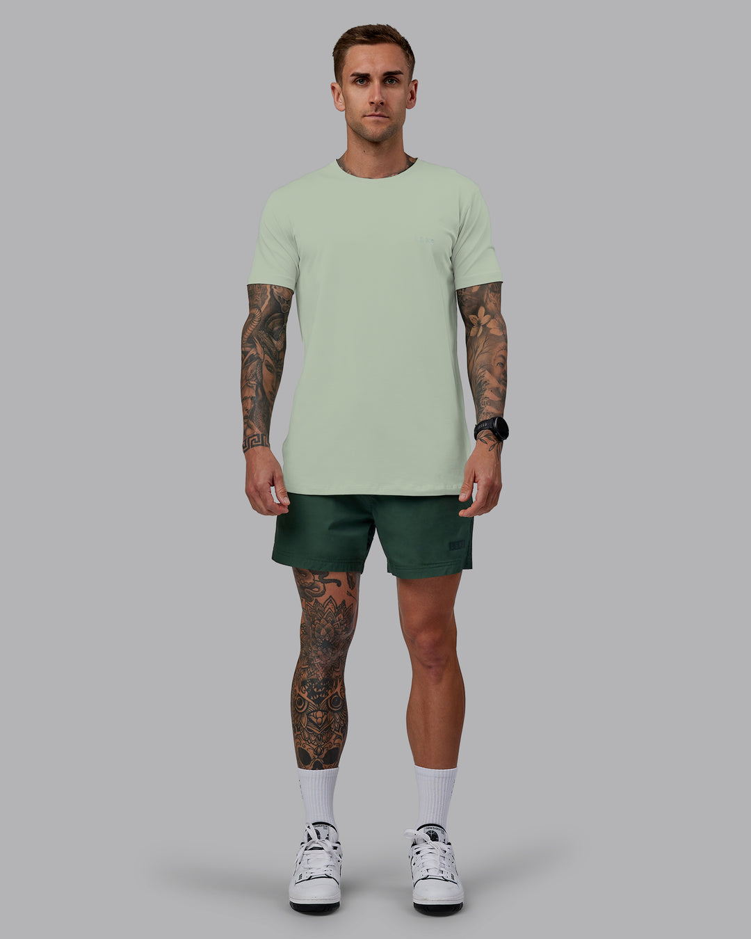 Man wearing Daily 5" Shorts - Cilantro - view 2
