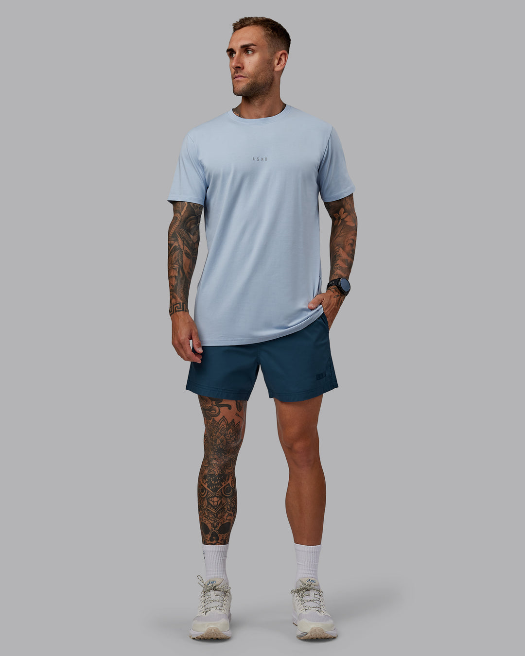 Man wearing Daily 5" Shorts - Indigo - view 5