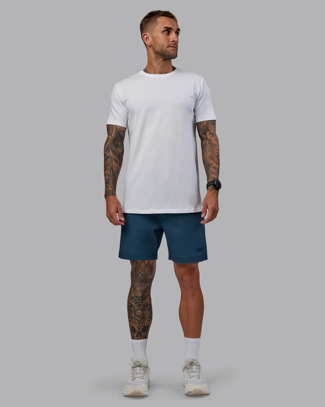 Man wearing Daily 7" Shorts - Indigo - view 5