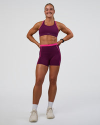 Woman wearing Distinction Sports Bra 2.0 - Plum Caspia-Ultra Pink | Model:Sav | Size:S | Thumbnail Index: 2
