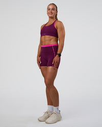 Woman wearing Distinction Sports Bra 2.0 - Plum Caspia-Ultra Pink | Model:Sav | Size:S | Thumbnail Index: 4