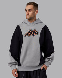 Man wearing Downtown Oversized Panel Hoodie - Circular Grey - Black | Model:Tommy | Size:S | Thumbnail Index: 1