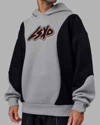 Man wearing Downtown Oversized Panel Hoodie - Circular Grey - Black | Model:Tommy | Size:S | Thumbnail Index: 8