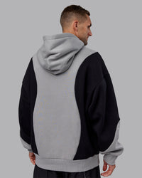 Man wearing Downtown Oversized Panel Hoodie - Circular Grey - Black | Model:Tommy | Size:S | Thumbnail Index: 3